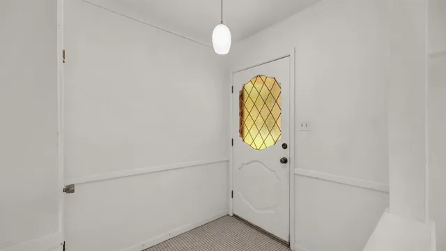 a view of a hallway with entryway