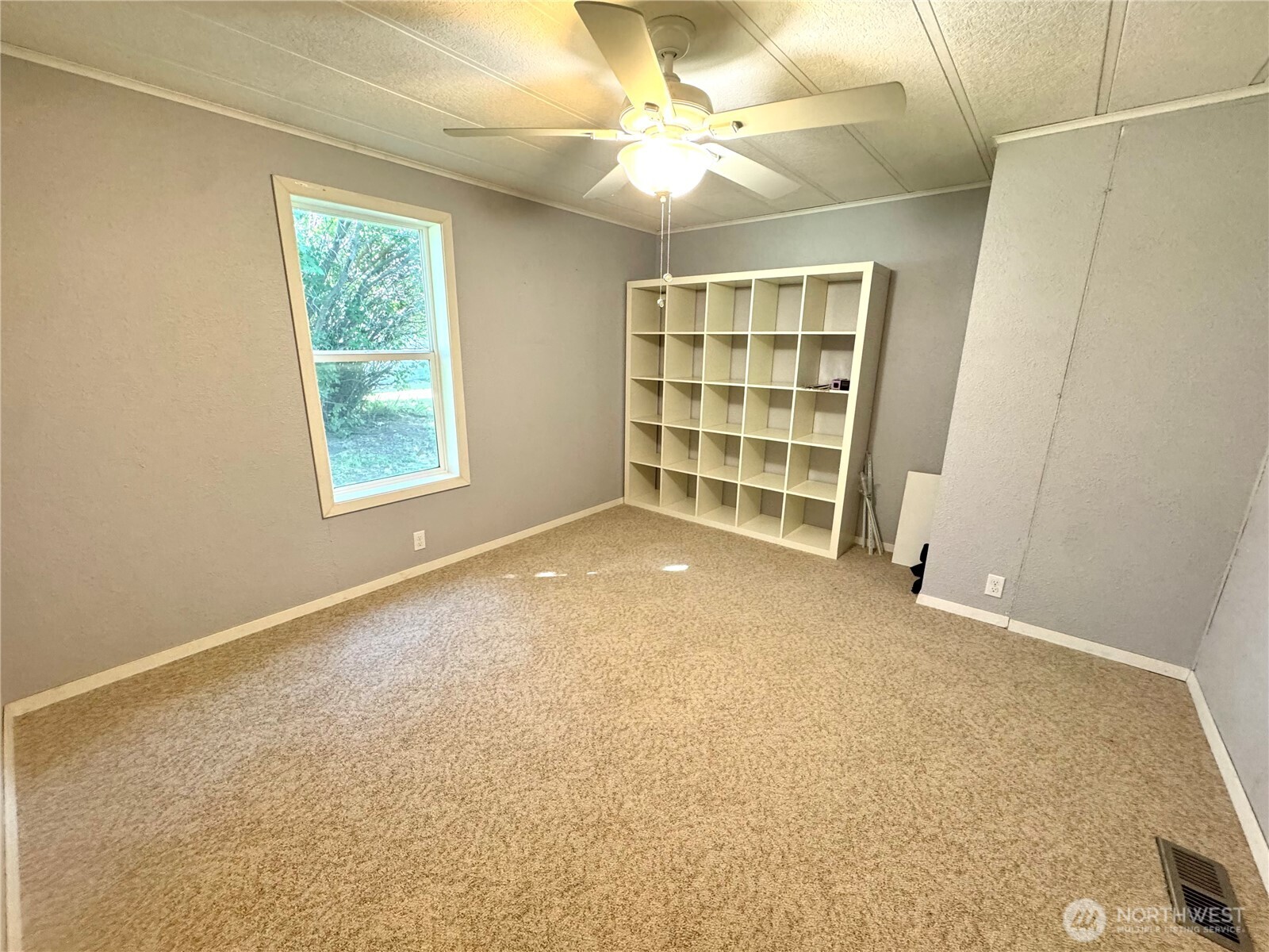 1218 South 3rd Street Dayton, WA 99328 - Photo 22 of 23 an empty room with windows and cabinet