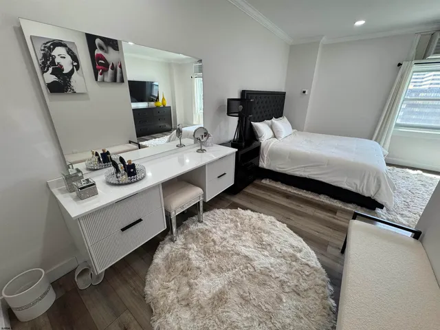 a view of entryway with wooden floor