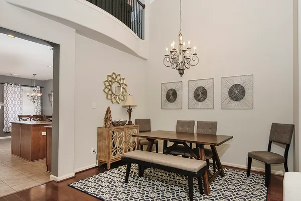 a view of a dining room with furniture