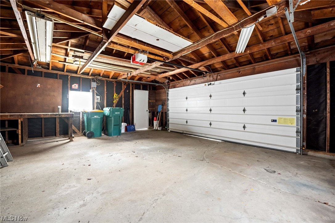 7221 Euclid Chardon Road Kirtland, OH 44094 - Photo 30 of 30 Garage with man-door, electric and storage