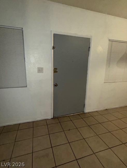 521 North Decatur Boulevard, Unit B Las Vegas, NV 89107 - Photo 5 of 17 Functional entry space features durable tile flooring, ready for everyday living.