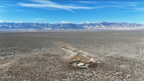 a view of a lake with a mountain