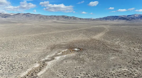 a view of a lake with mountain