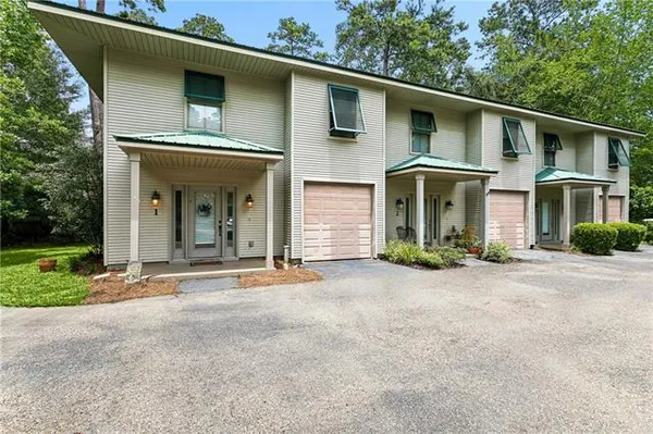 $205,000 | 590 Lotus Drive North, Unit 1, Mandeville, LA 70471