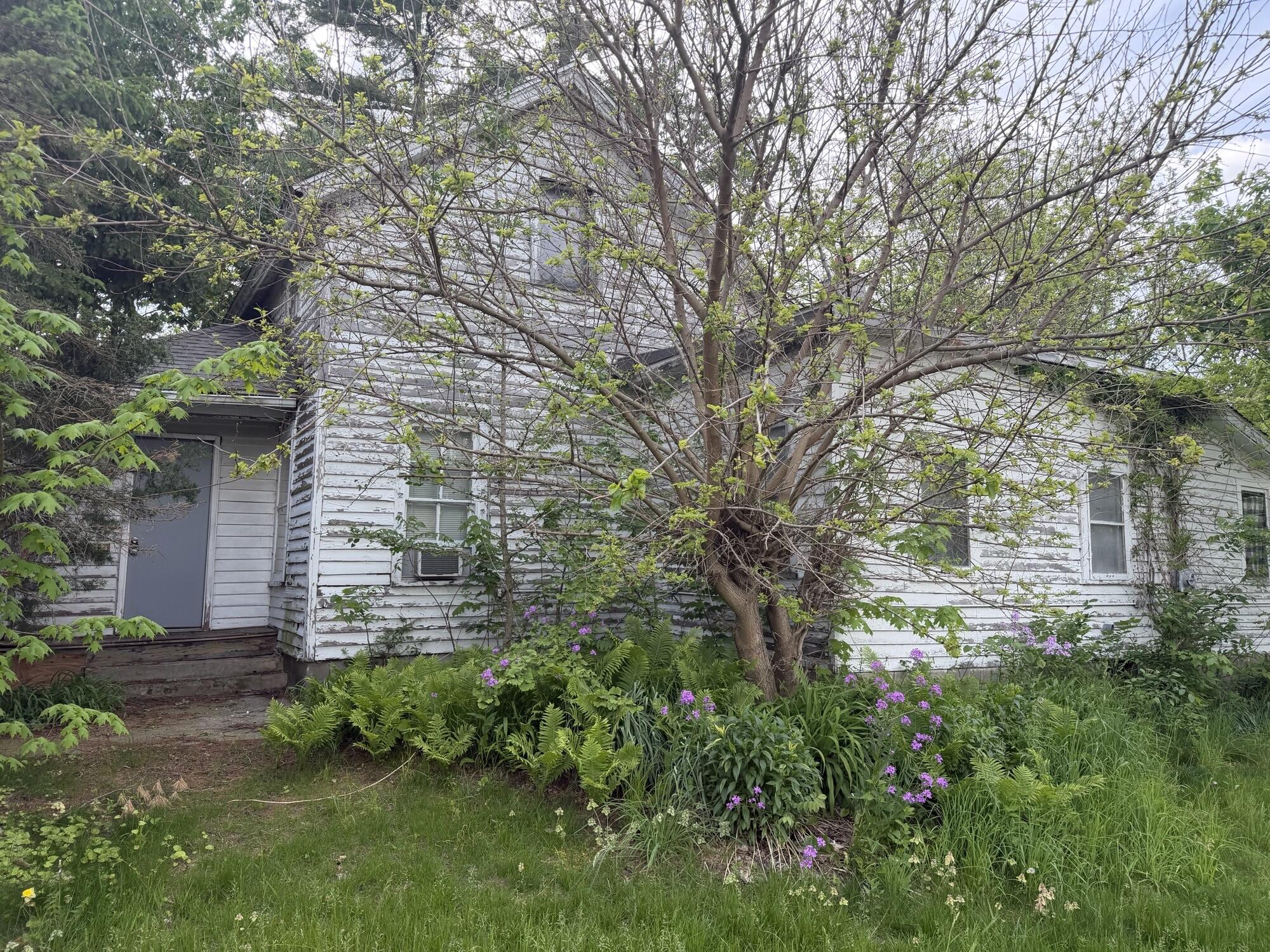 main entrance to enclosed porch