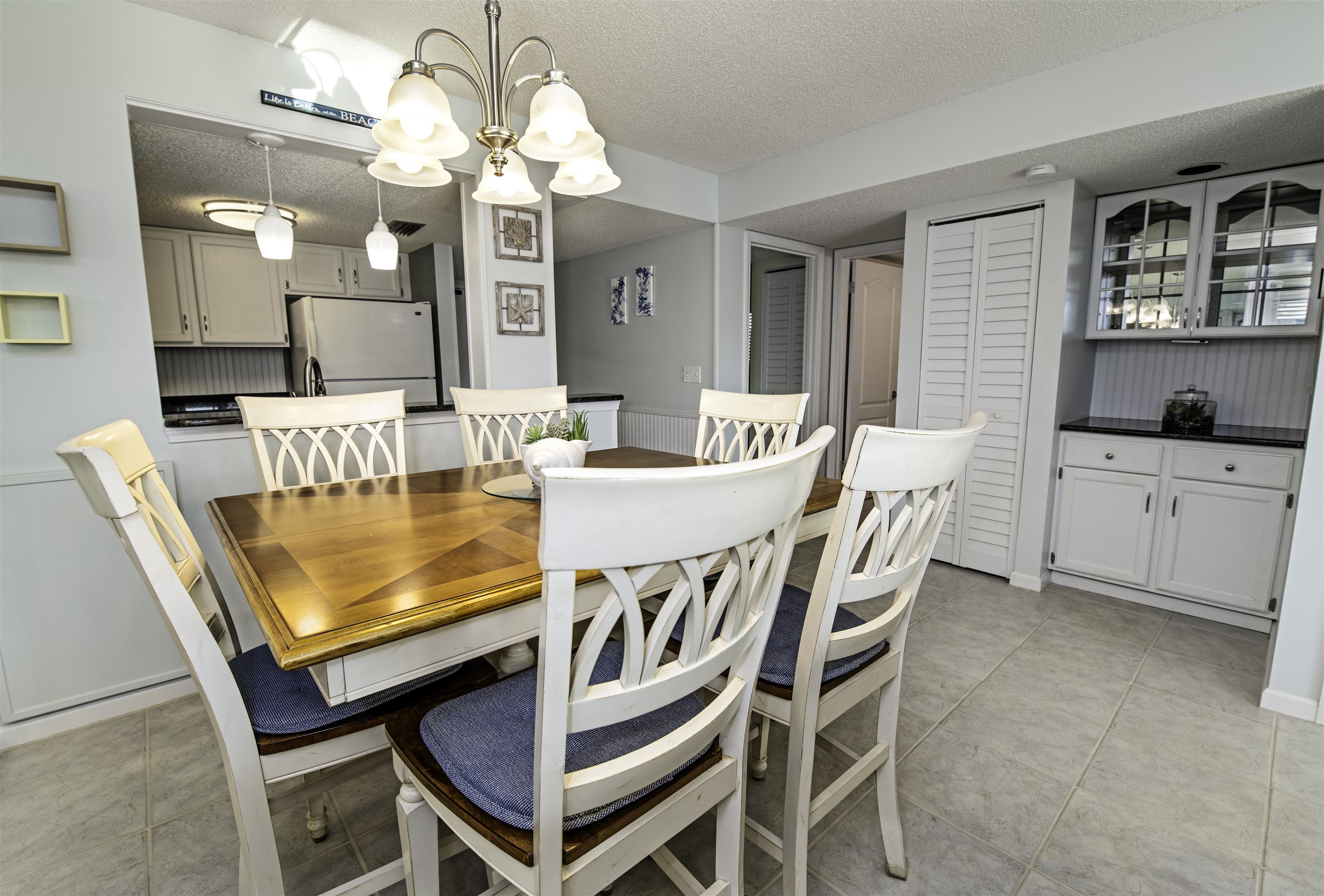 880 A1A Beach Boulevard, Unit 7302 St. Augustine, FL 32080 - Photo 2 of 28 a dining room with furniture and window