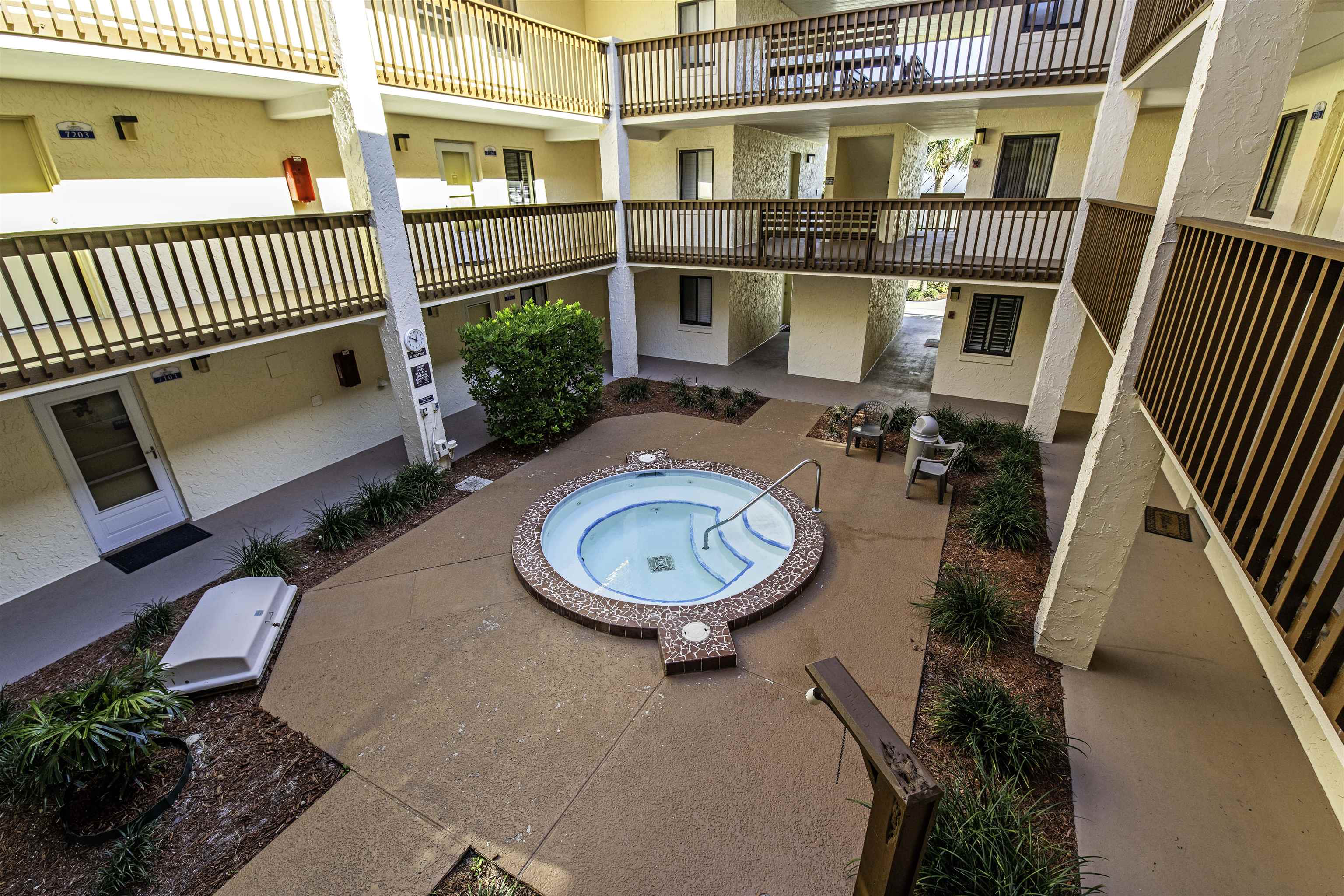 880 A1A Beach Boulevard, Unit 7302 St. Augustine, FL 32080 - Photo 22 of 28 an outdoor view of a house with backyard and deck