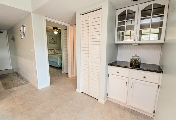 a view of cabinets and window