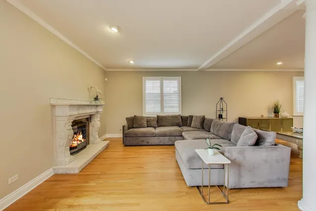 a workspace with wooden floor and a window