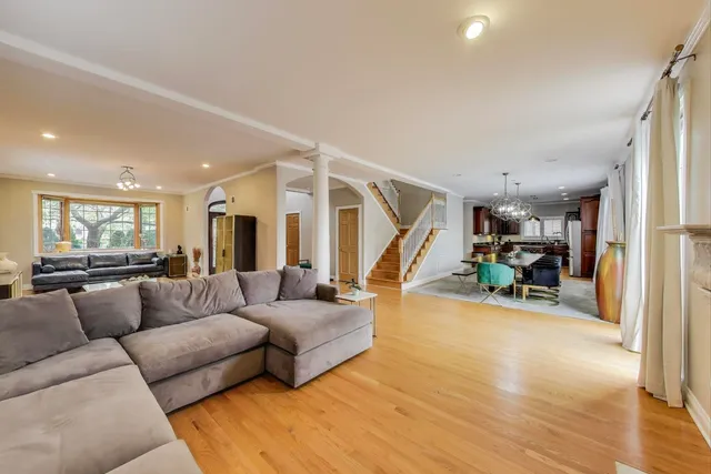 a living room with furniture and a table
