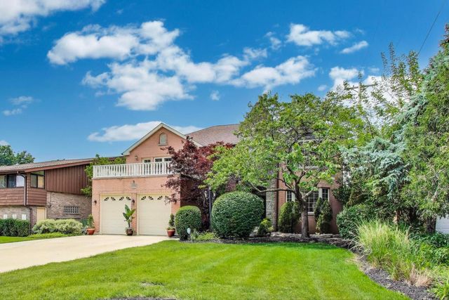 a view of a house with a big yard