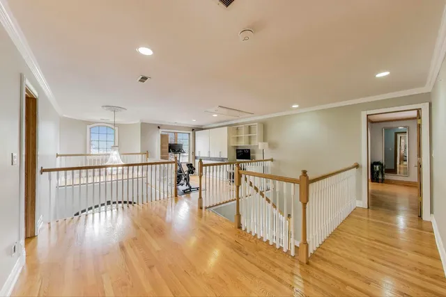 a view of a hallway with a livingroom