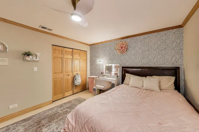 a view of a bedroom with bed and furniture