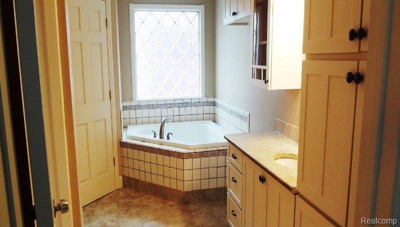 1100 Cove Road Goodells, MI 48027 - Photo 14 of 16 Master bathroom.jpg