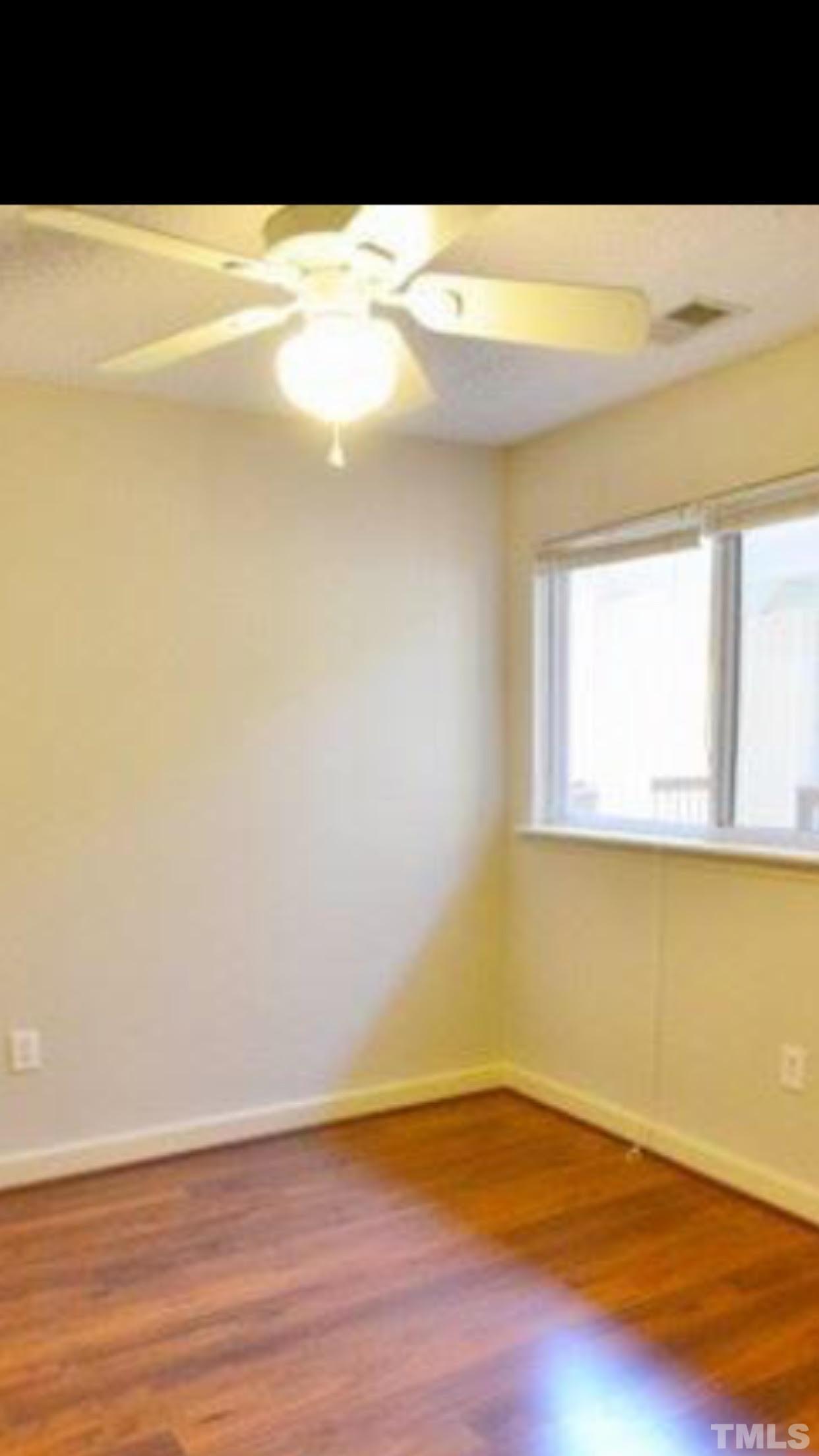 303 Smith Level Road, Unit D21 Chapel Hill, NC 27516 - Photo 1 of 8 a view of an empty room and window