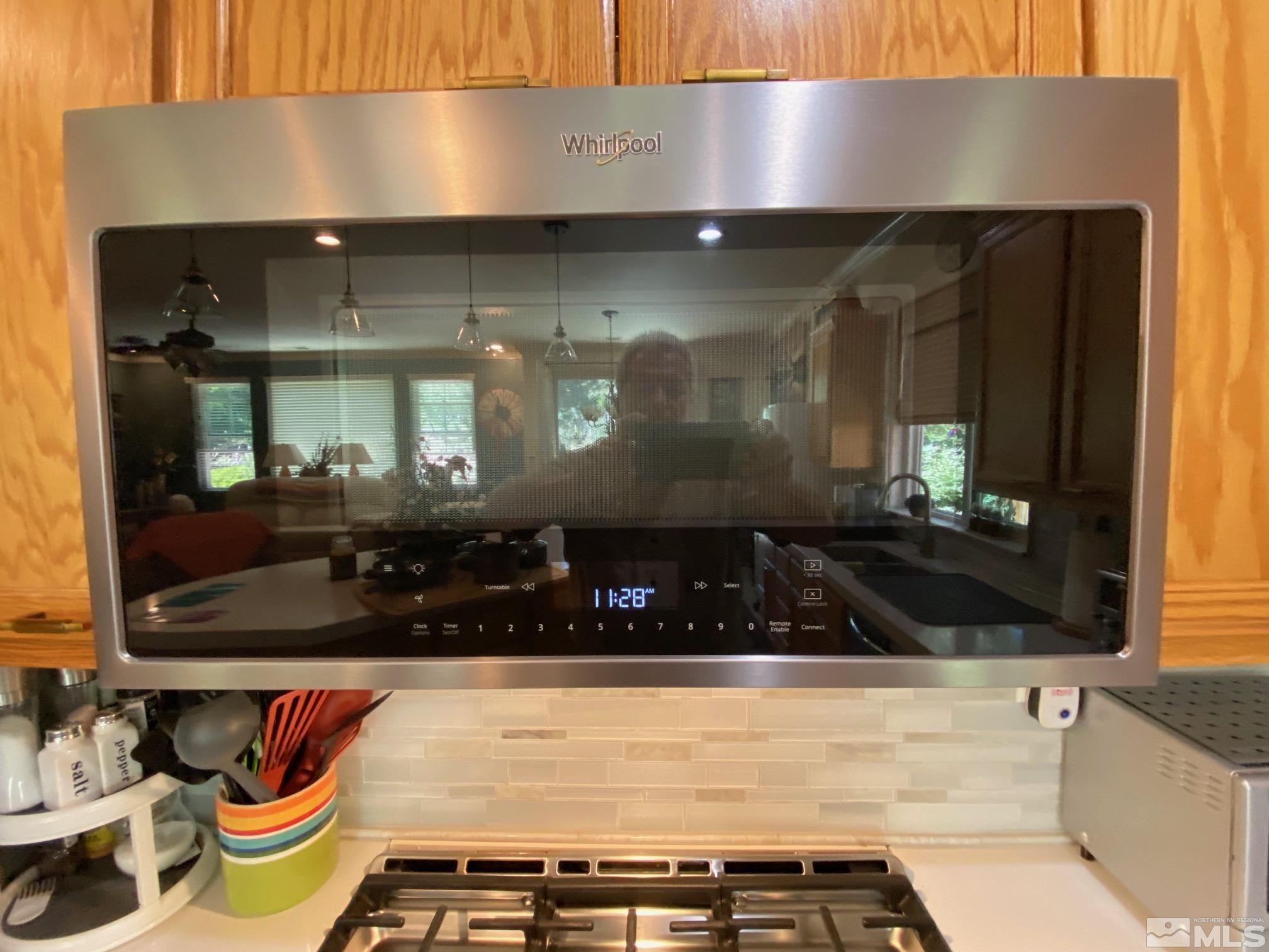 7875 Morgan Pointe Circle Reno, NV 89523 - Photo 11 of 31 a kitchen with a stove and cabinets