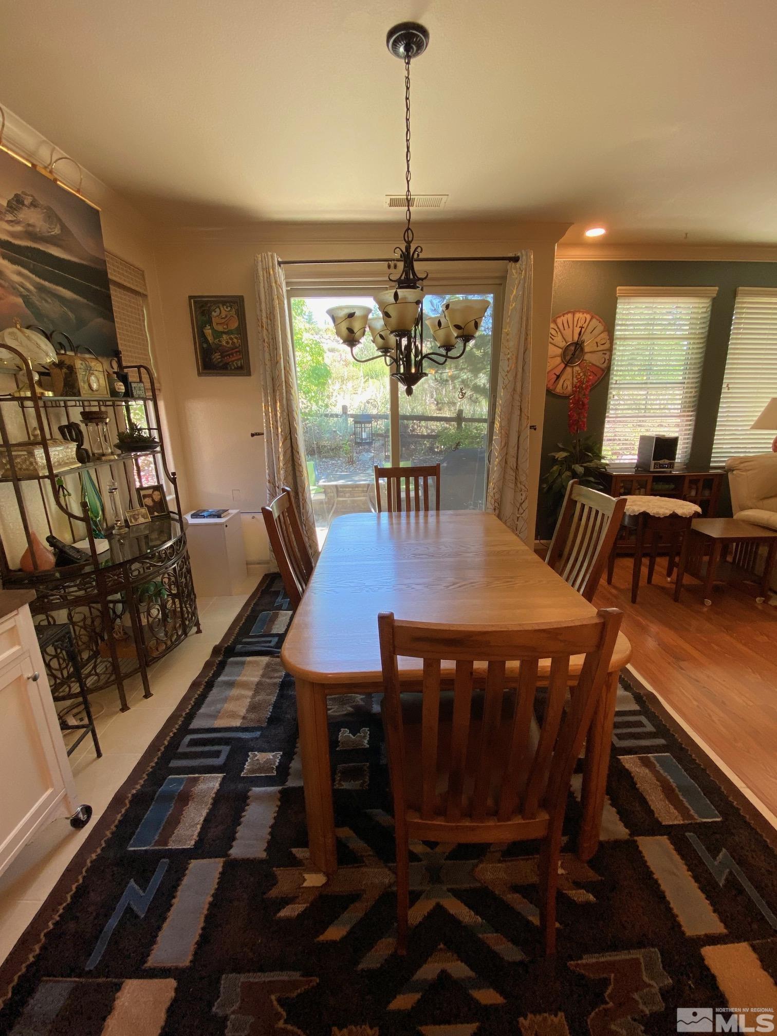 7875 Morgan Pointe Circle Reno, NV 89523 - Photo 13 of 31 a view of a dining room with furniture window and outside view