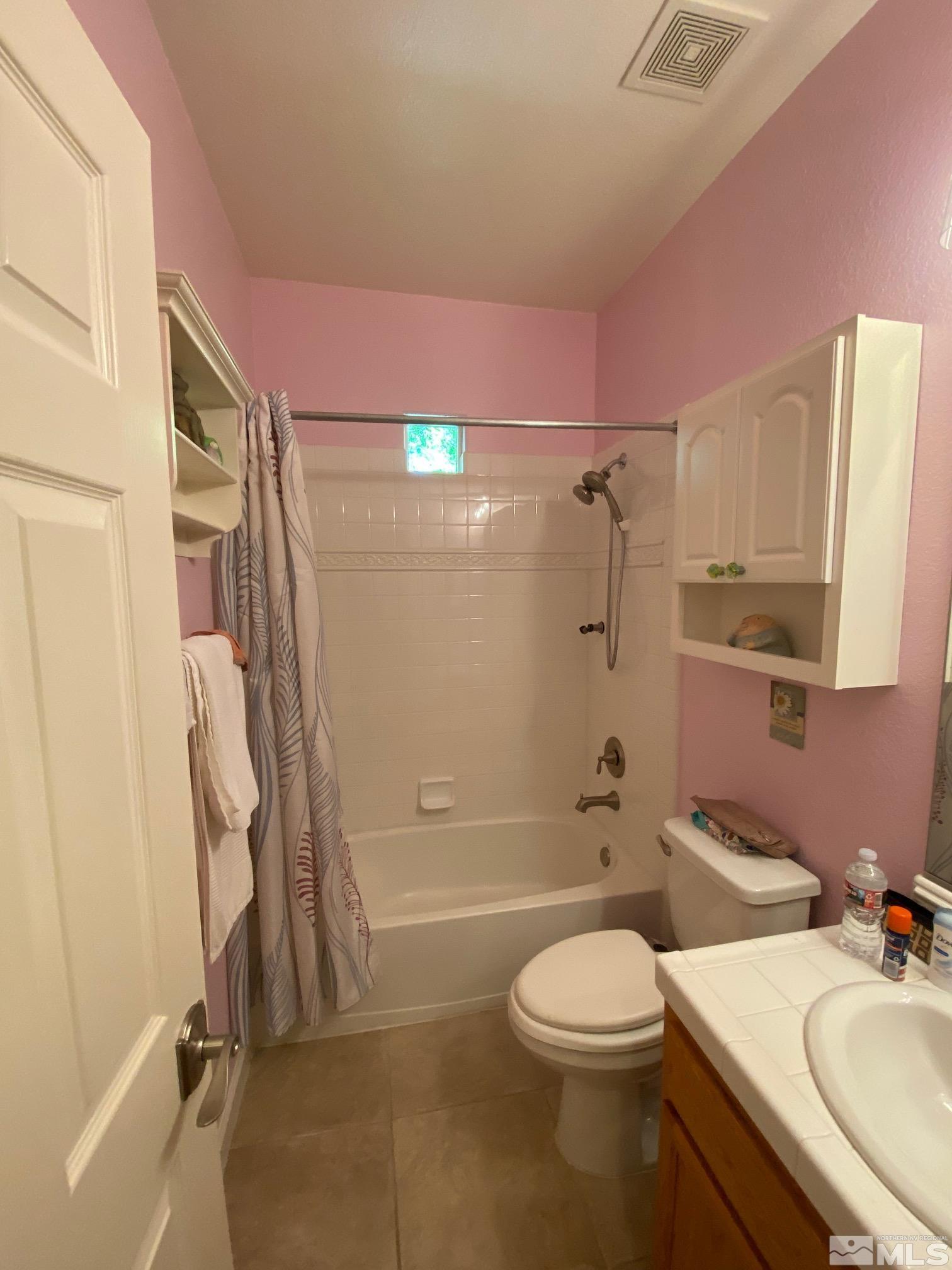 7875 Morgan Pointe Circle Reno, NV 89523 - Photo 16 of 31 a bathroom with a granite countertop sink toilet and shower