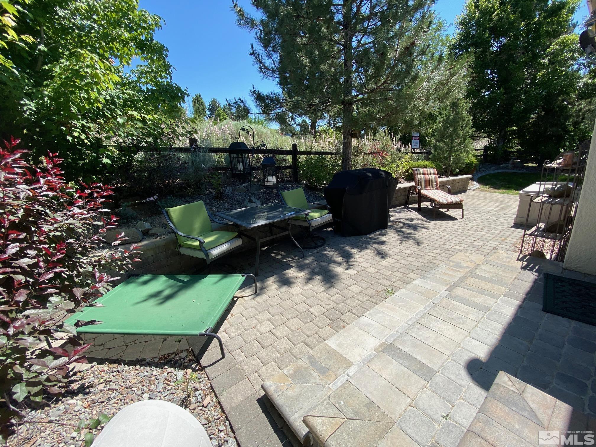 7875 Morgan Pointe Circle Reno, NV 89523 - Photo 25 of 31 a view of a backyard with sitting area