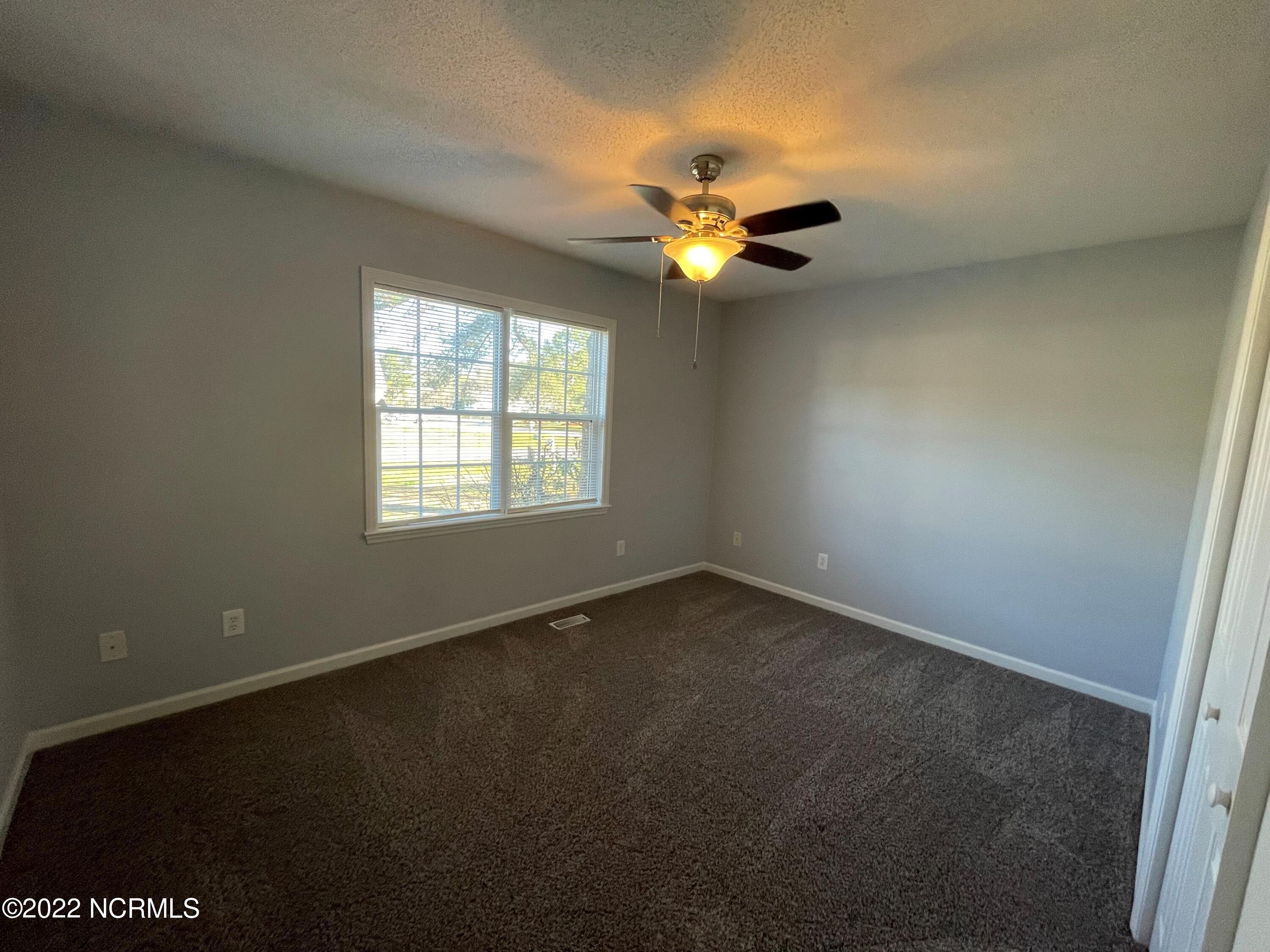 103 Holly Berry Road New Bern, NC 28560 - Photo 8 of 10 Sunny Bedroom