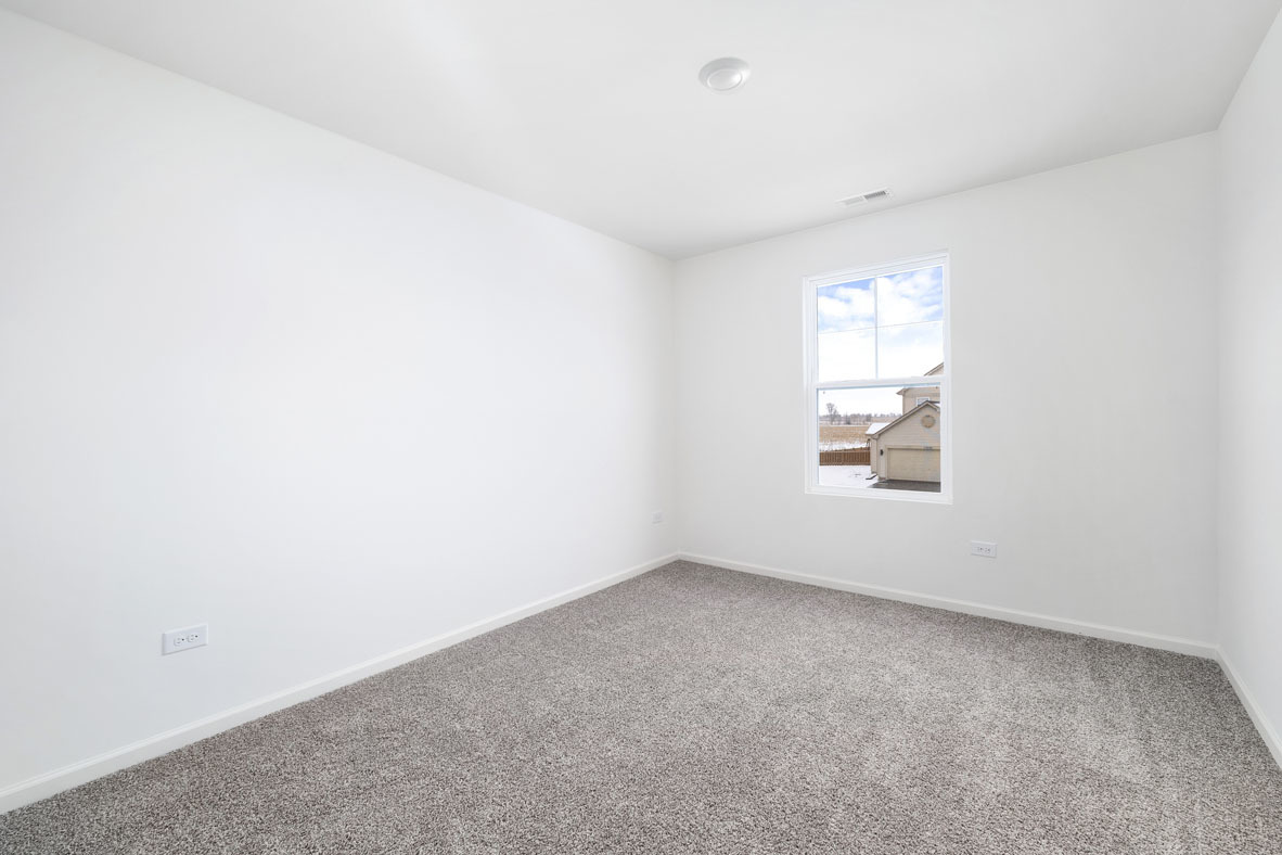 3719 Monte Carlo Way Joliet, IL 60421 - Photo 32 of 32 an empty room with a window