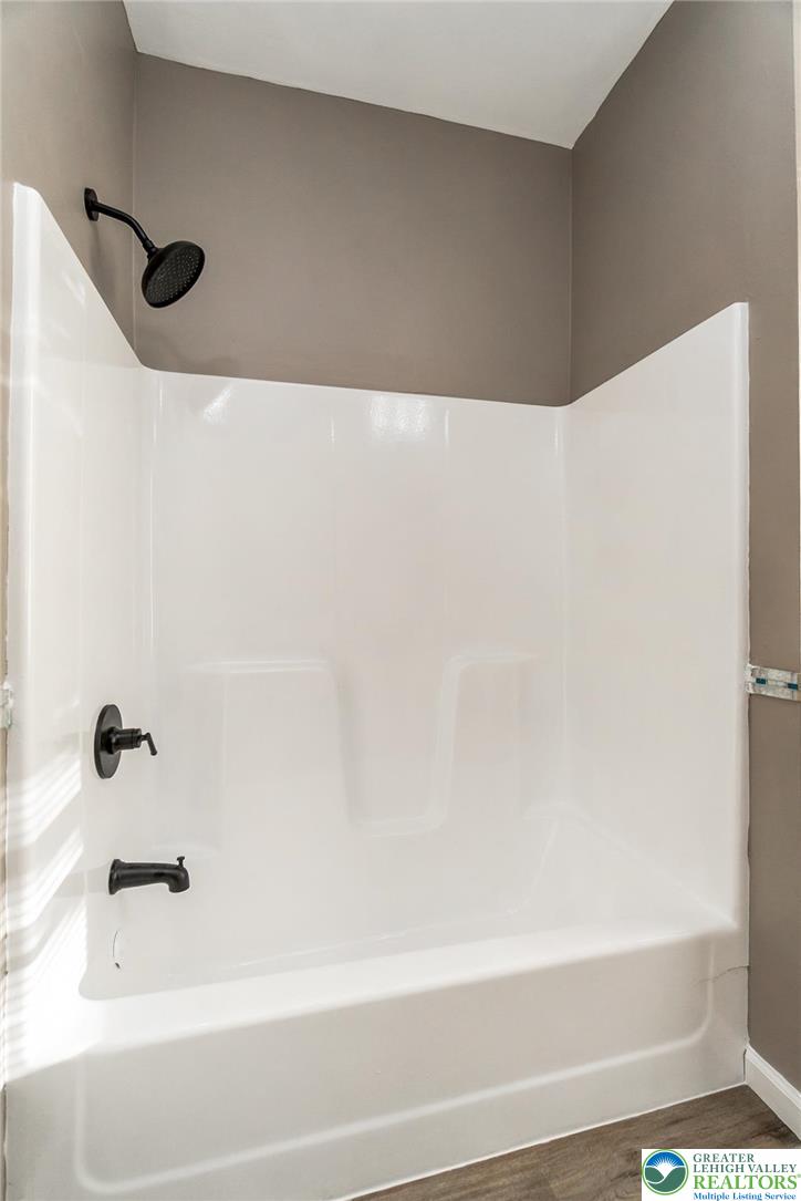 2213 Village Road Orefield, PA 18069 - Photo 17 of 41 a bathroom with a bathtub