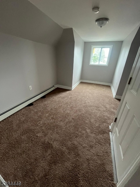 171 Seymour Avenue, Unit 3 Newark, NJ 07108 - Photo 5 of 9 a view of an empty room and window