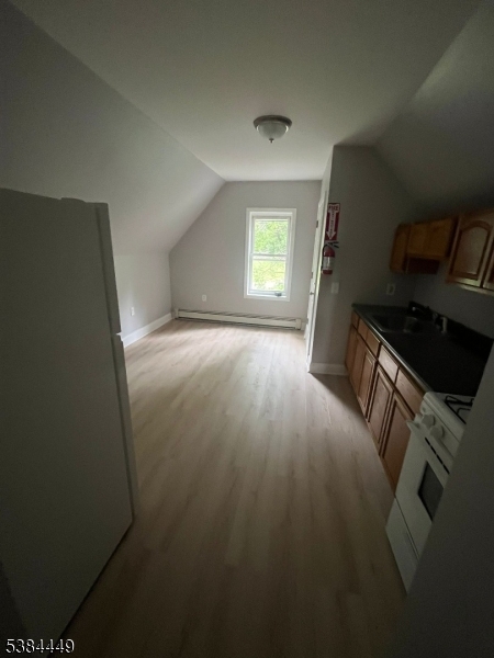 171 Seymour Avenue, Unit 3 Newark, NJ 07108 - Photo 7 of 9 a view of an empty room and window