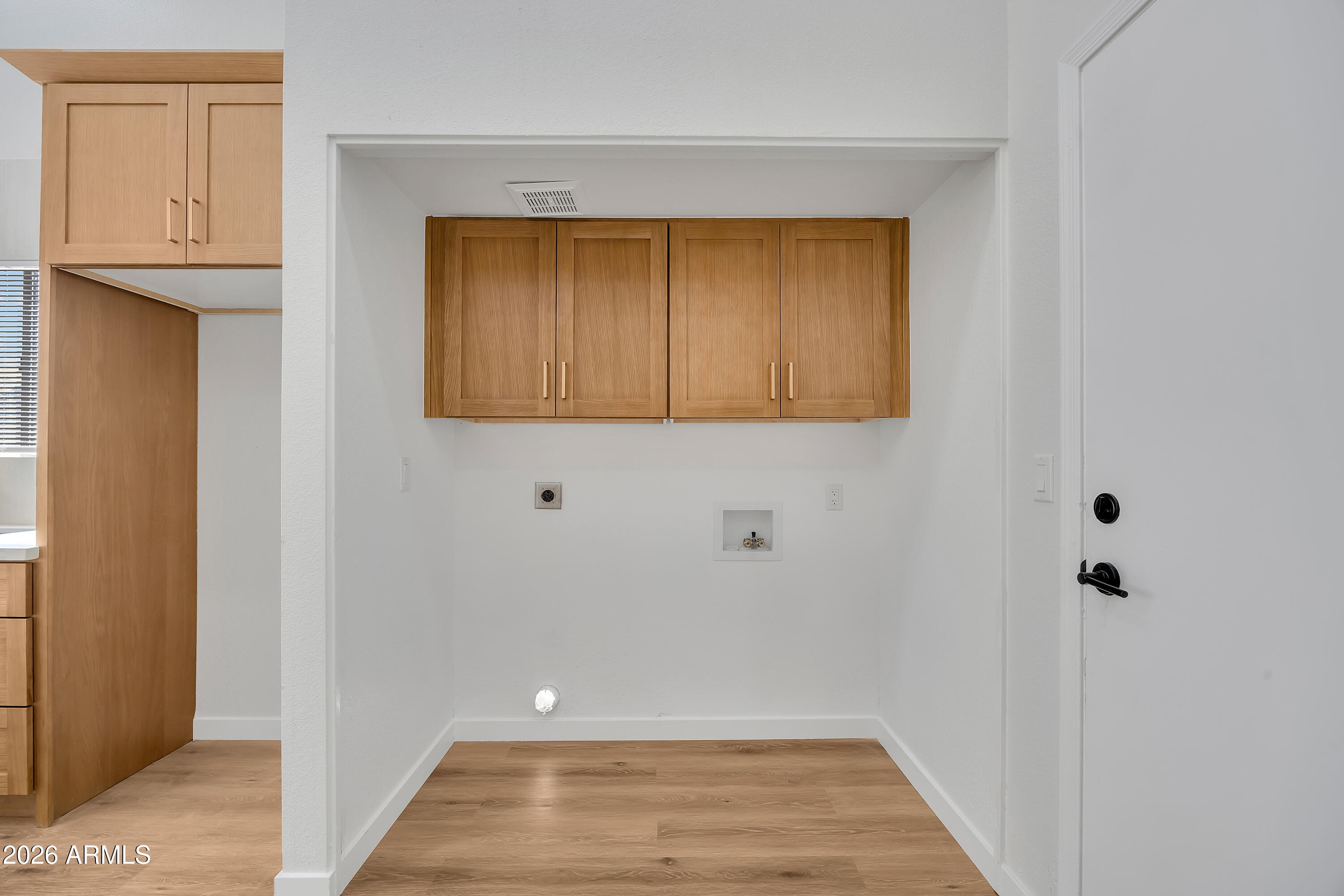 613 West Tara Court Gilbert, AZ 85233 - Photo 11 of 25 a view of a door with wooden floor