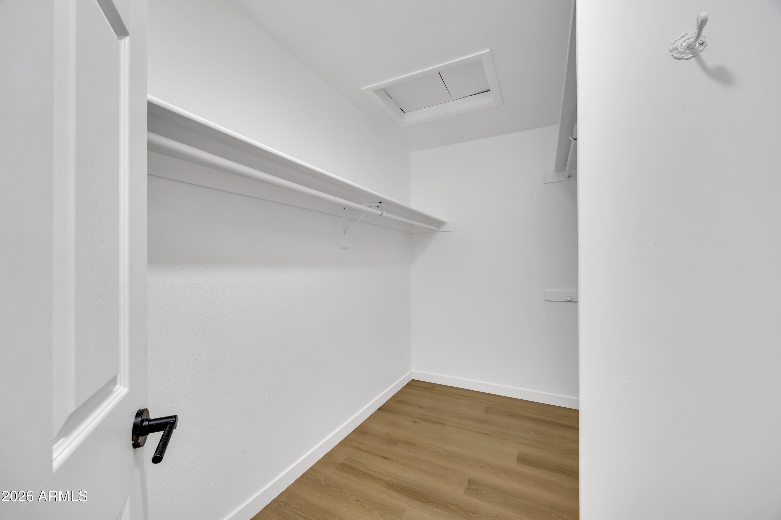 613 West Tara Court Gilbert, AZ 85233 - Photo 18 of 25 a view of a room with wooden floor