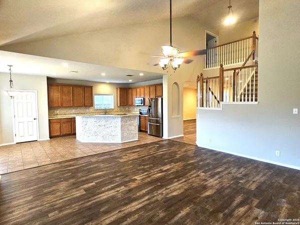 a view of a kitchen with a sink and a kitchen view