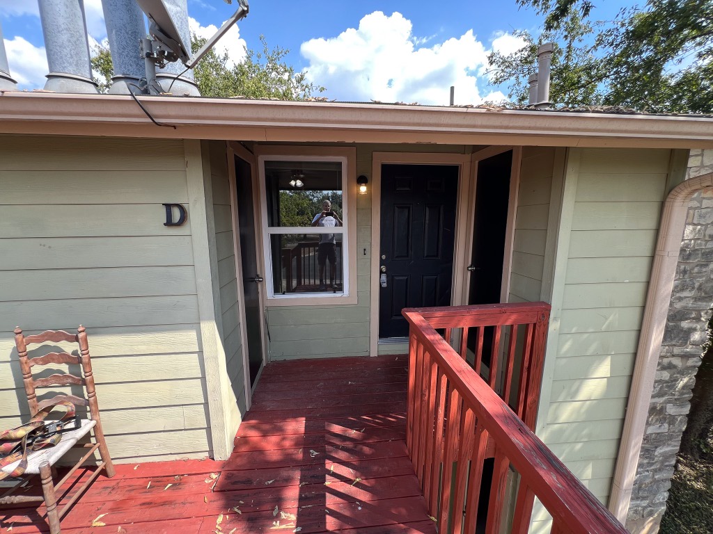 9703 Roxanna Drive, Unit D Austin, TX 78748 - Photo 2 of 24 View of exterior entry with a deck