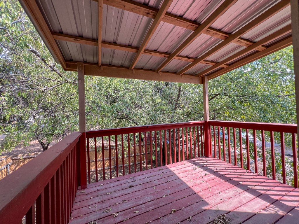 9703 Roxanna Drive, Unit D Austin, TX 78748 - Photo 24 of 24 View of wooden deck Unstaged