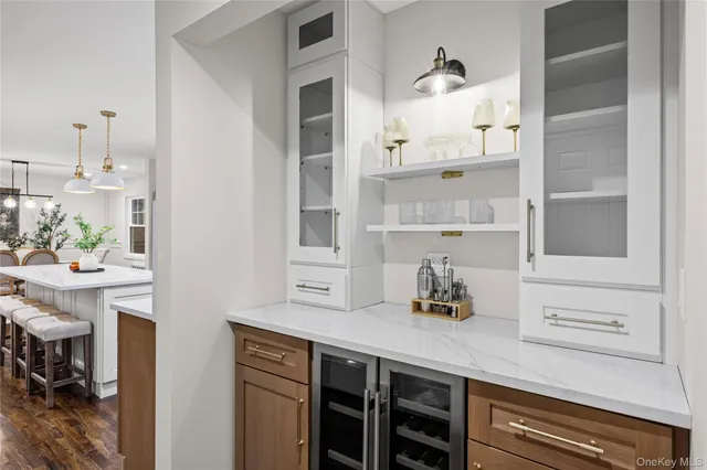 a kitchen with cabinets and window
