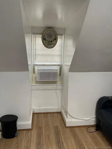 a stove top oven sitting inside of a kitchen