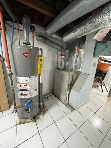 a view of a house with a yard and garage