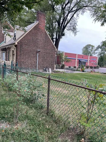 a backyard of a house with lots of green space