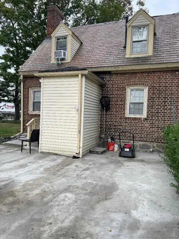 a view of a house with a patio