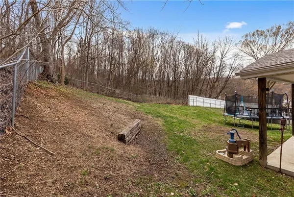 a house view with a backyard space