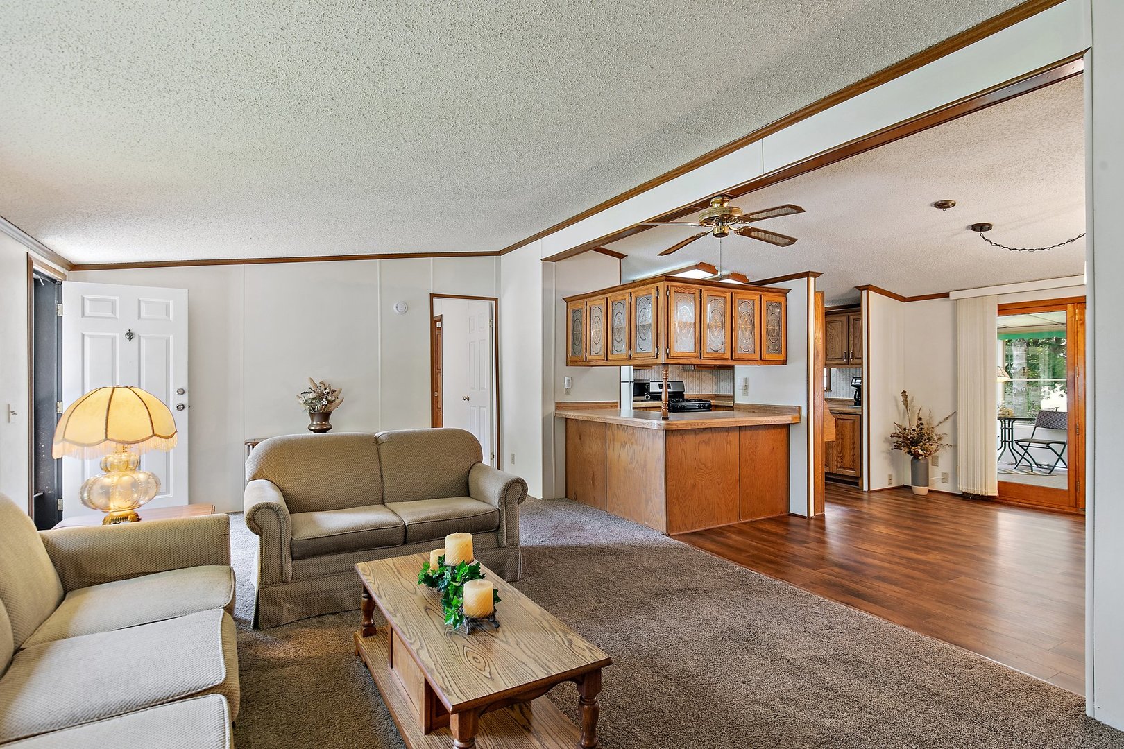 8566 Fig Tree Lane Roscoe, IL 61073 - Photo 3 of 14 a living room with furniture and wooden floor