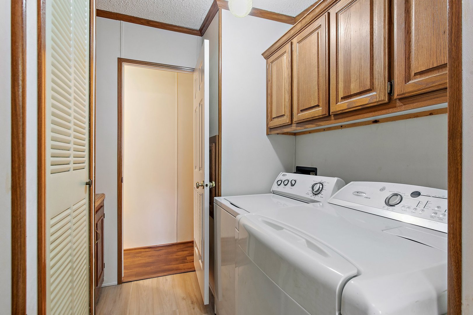 8566 Fig Tree Lane Roscoe, IL 61073 - Photo 8 of 14 a utility room with dryer and washer