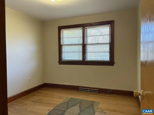 a view of a room with a window