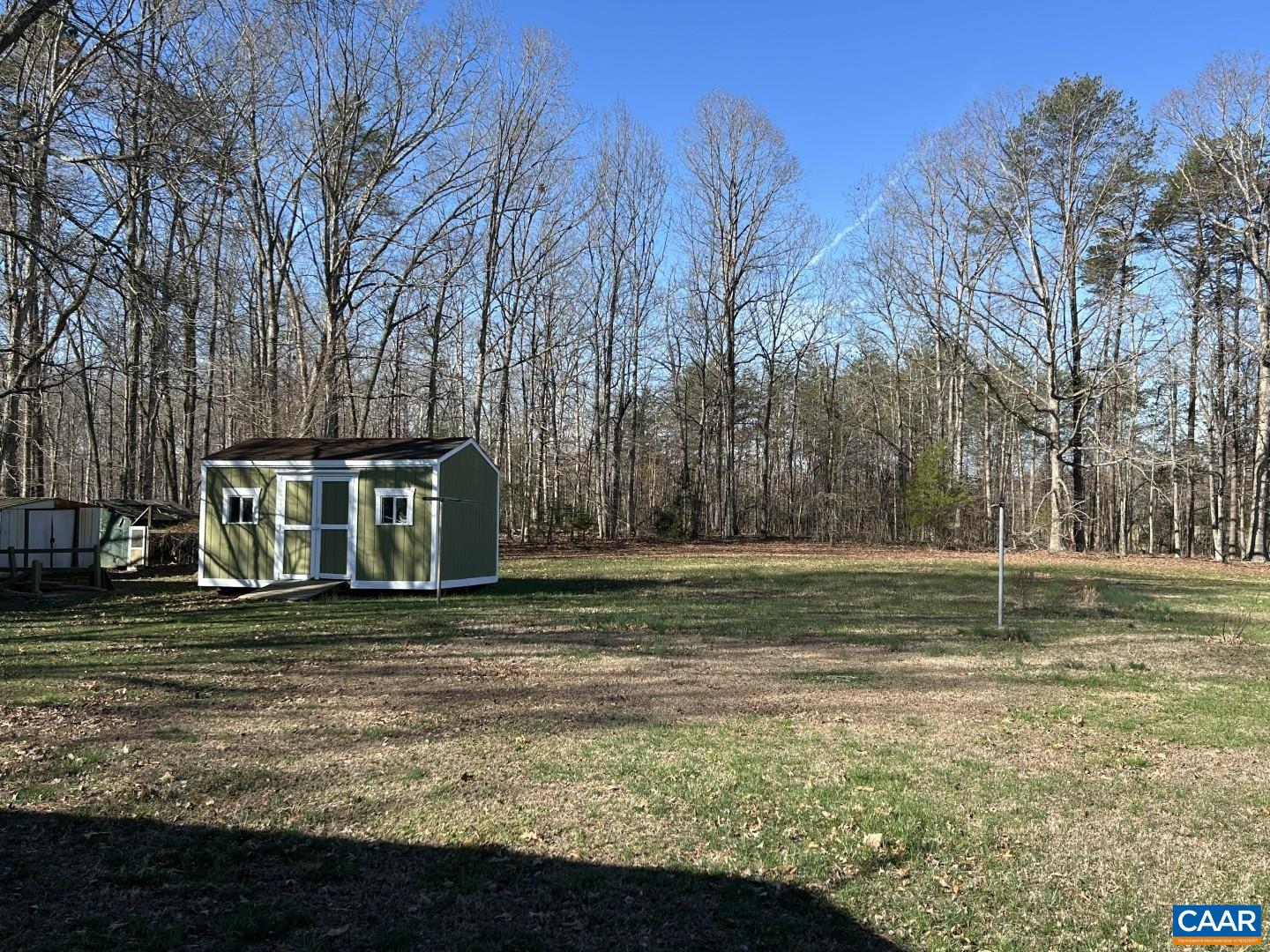 7714 Blenheim Road Scottsville, VA 24590 - Photo 31 of 35 a white house with a outdoor space