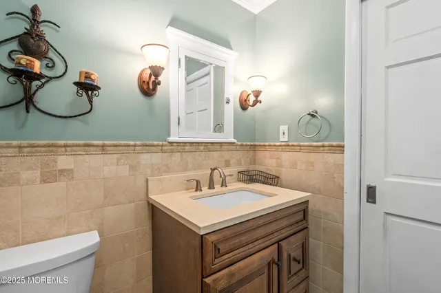 a view of a room with rack and windows