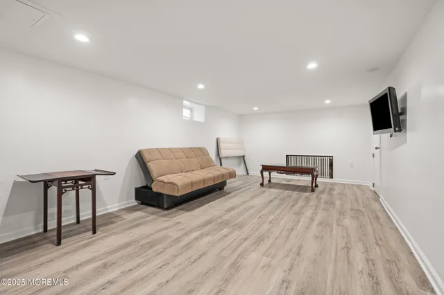 a bathroom with a glass shower door