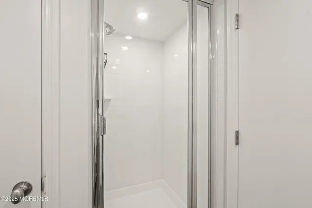 a view of multiple houses with a street