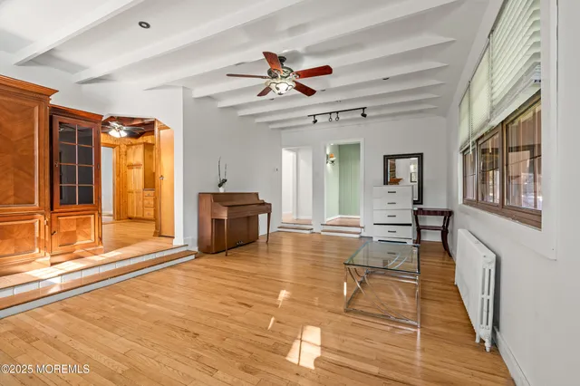 a kitchen with stainless steel appliances granite countertop a stove and a refrigerator