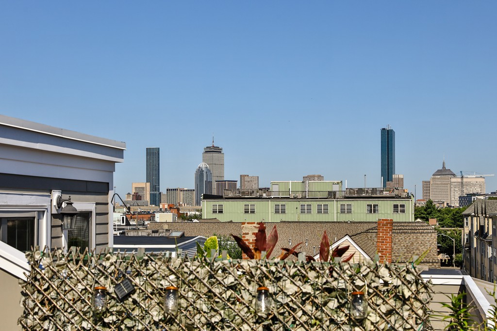 161 Tudor Street, Unit 4 Boston, MA 02127 - Photo 25 of 28 a view of a swimming pool with outdoor seating