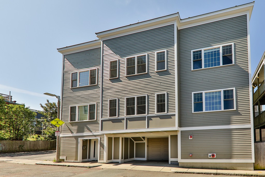 161 Tudor Street, Unit 4 Boston, MA 02127 - Photo 26 of 28 a front view of a building